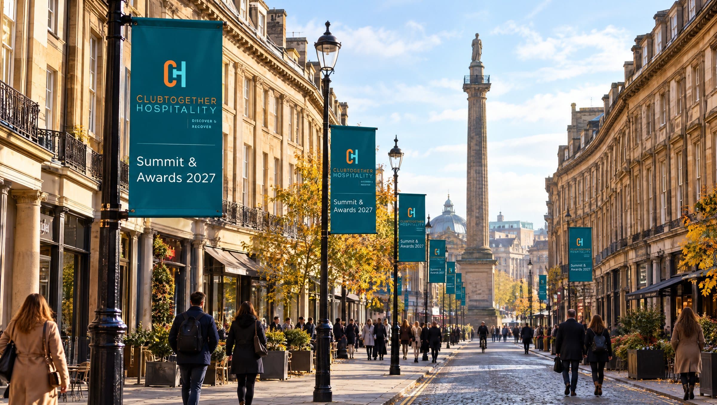 Summit banners on the lamp posts of Grey Street, Newcastle, with Grey’s Monument in the distance